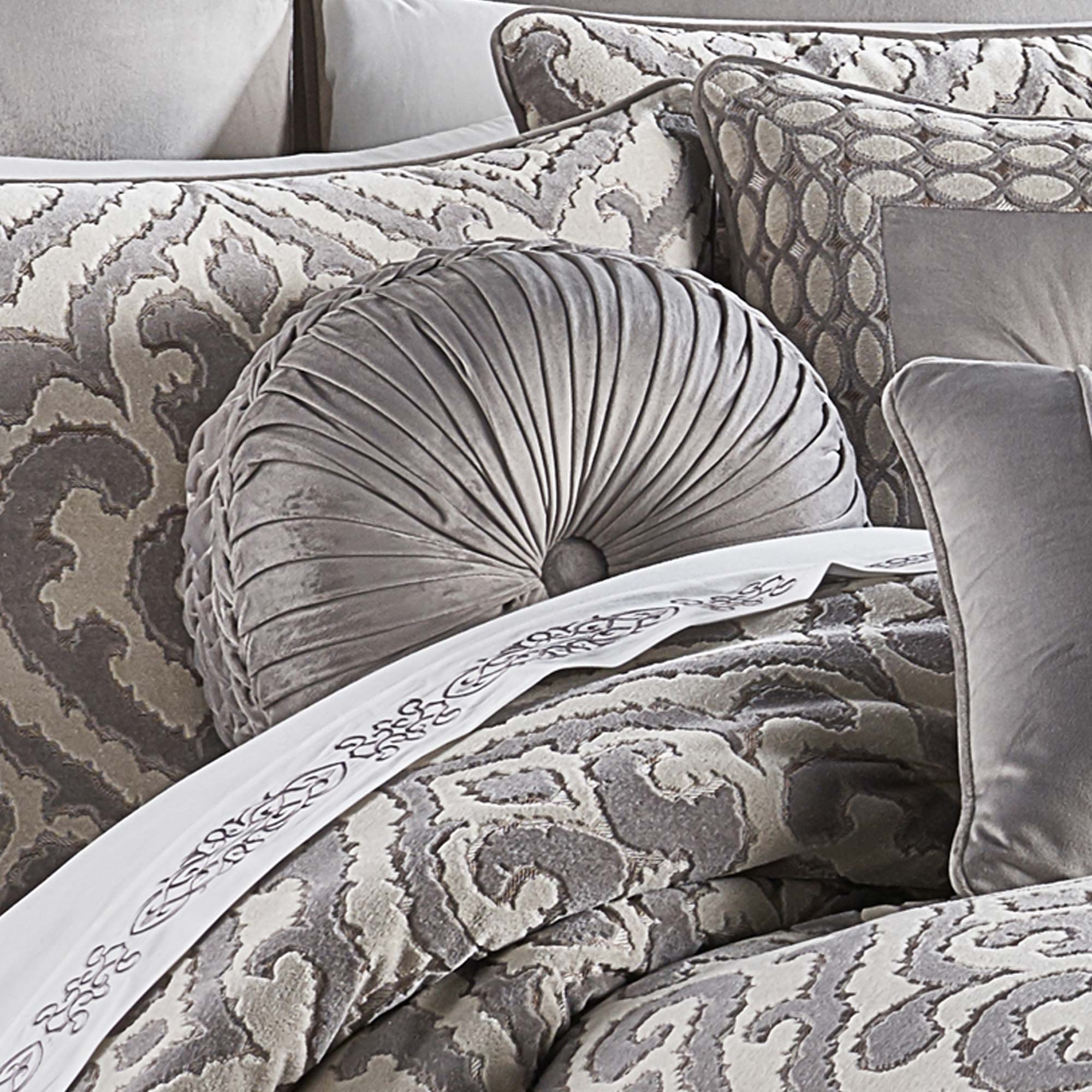 Belvedere Tufted Round Decorative Throw Pillow in Silver by J.Queen New York